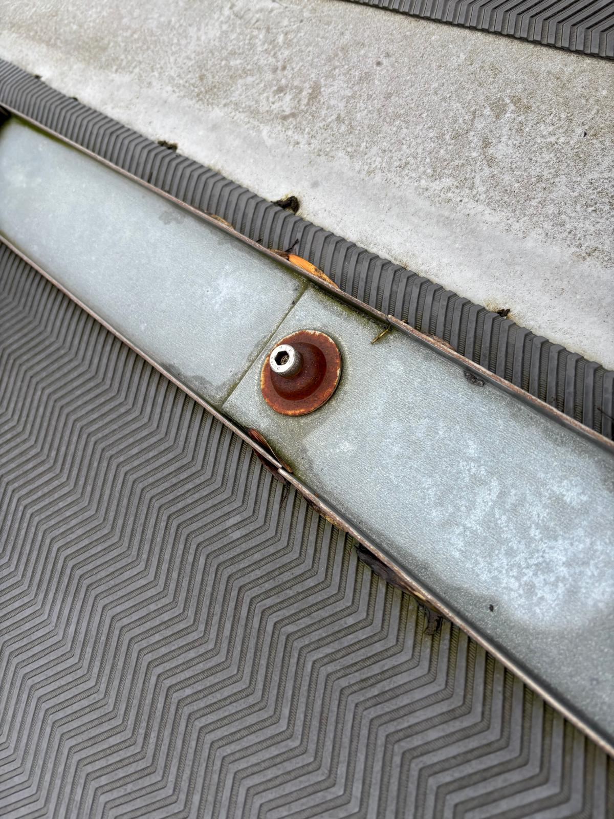 Rusted roof fixing bolt causing leak